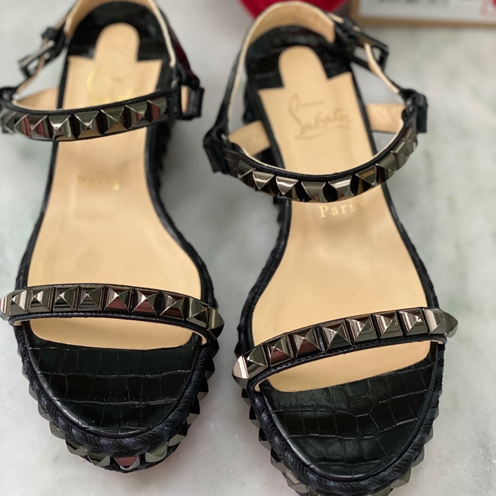 Brand new Christian L wedges